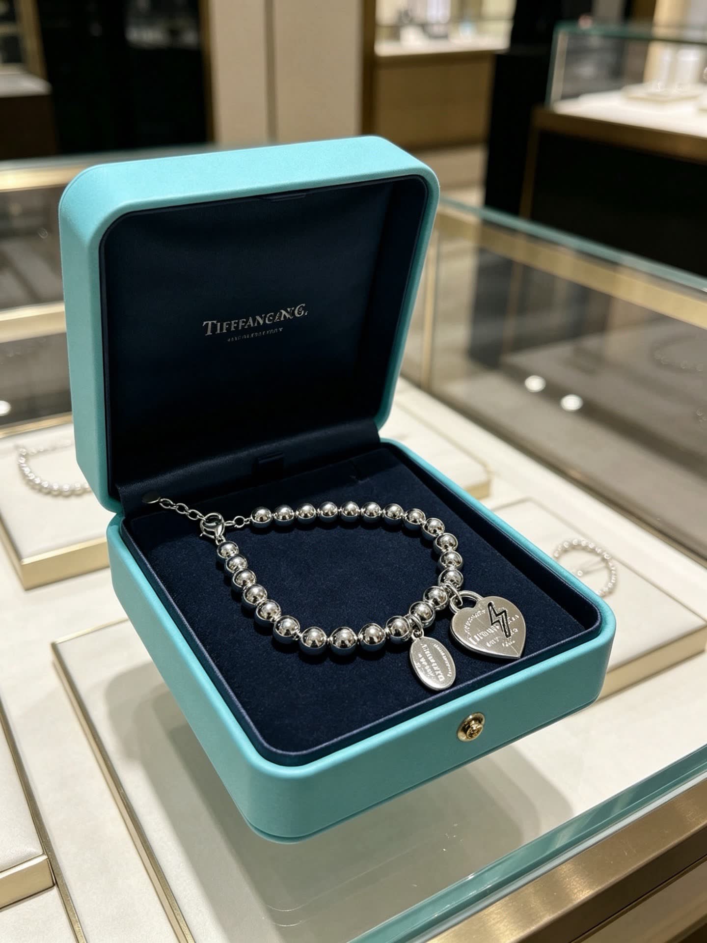 Tiffany & Co. Sterling Silver Bead Bracelet with Heart Tag